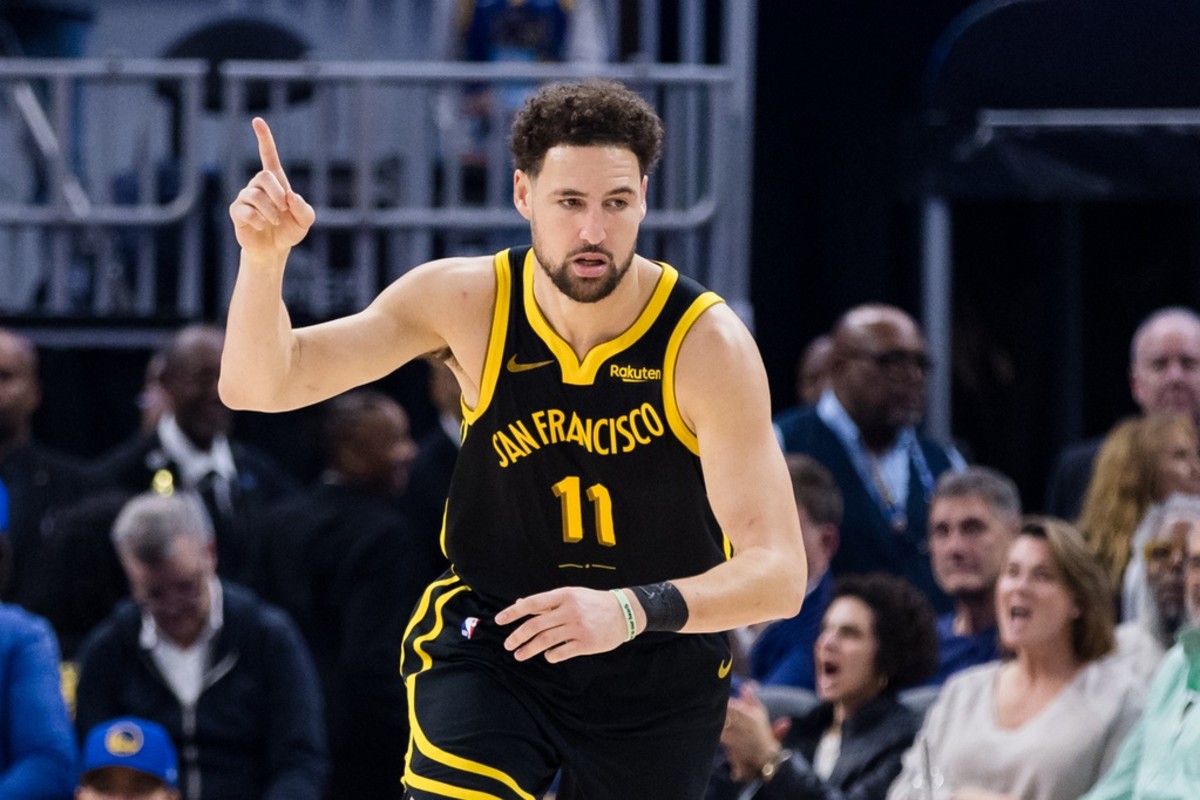Golden State Warriors guard Klay Thompson reacts after hitting a three-point shot
